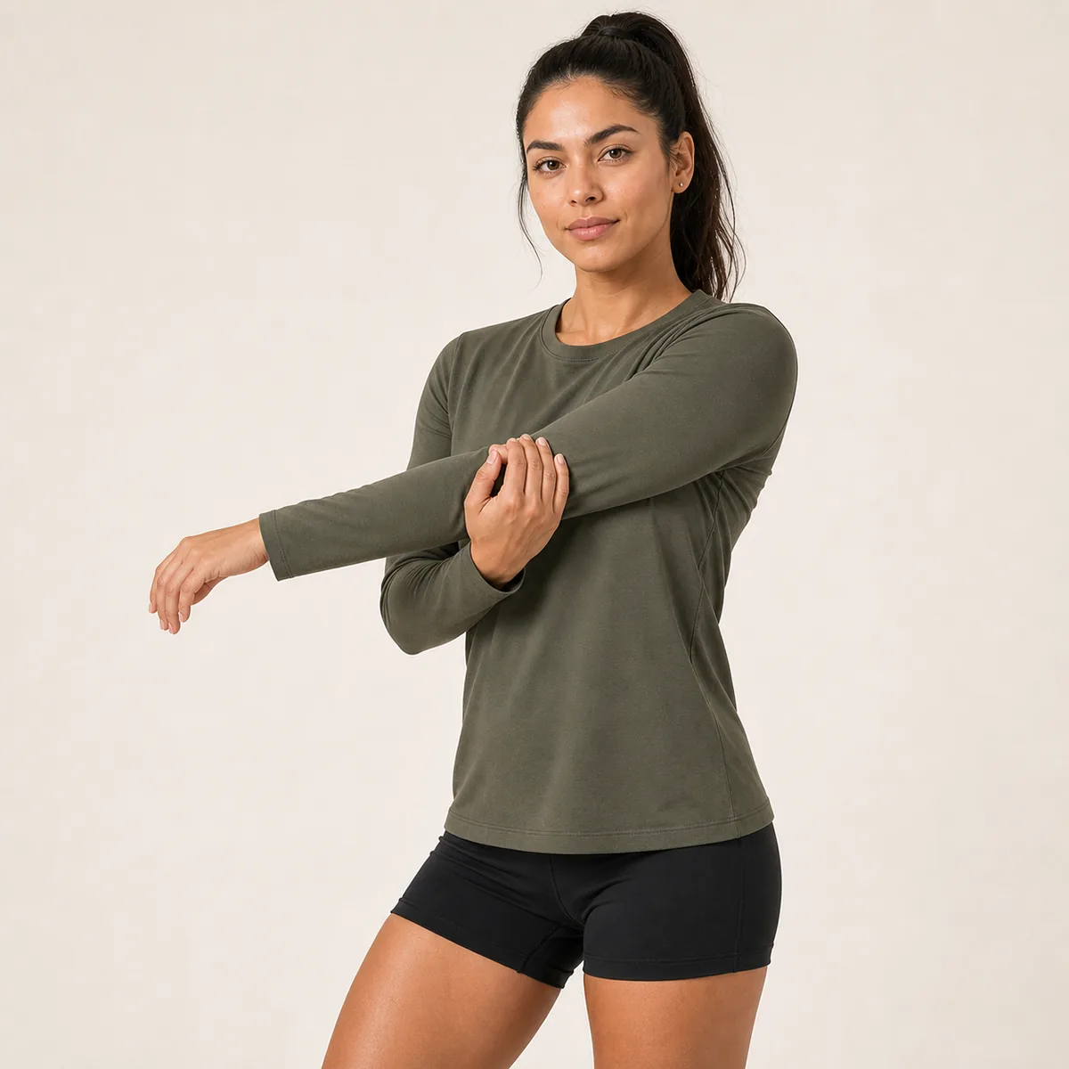 Custom women long sleeve activewear top by Brandex Sourcing Bangladesh, OEM activewear manufacturer in Bangladesh.
