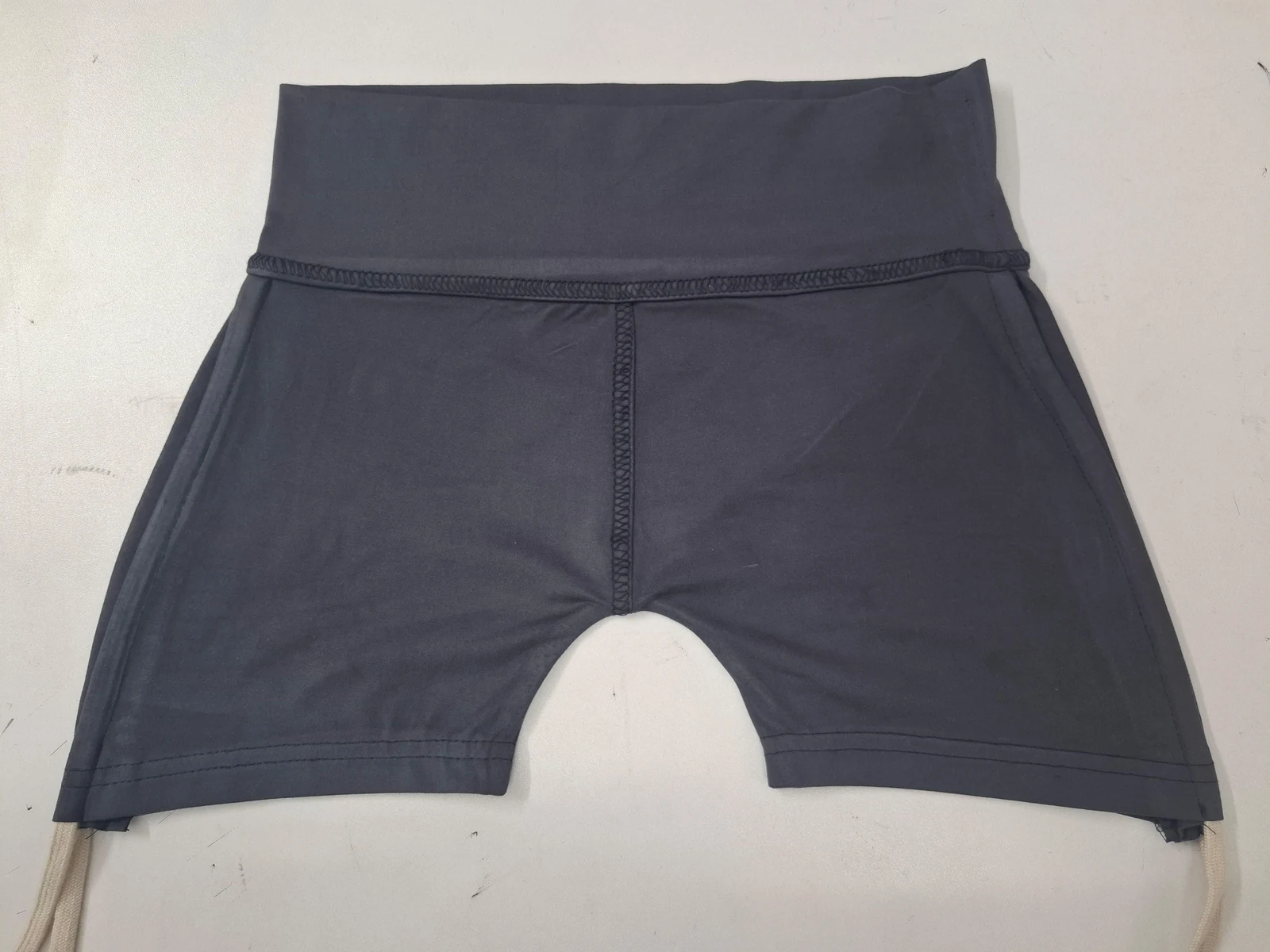 Custom black cycling shorts in nylon-spandex for private-label activewear manufacturing in Bangladesh by Brandex Sourcing.